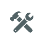 A hammer and wrench are next to each other.